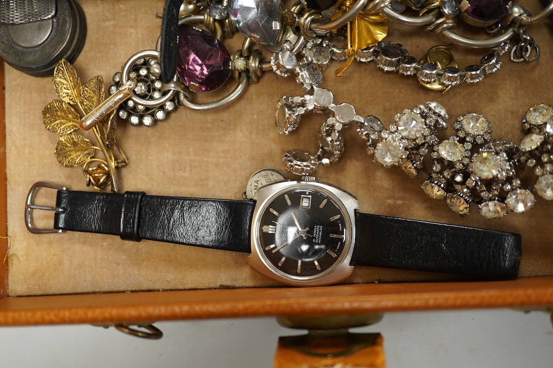 A quantity of assorted antique and later costume jewellery to include a silver and Marcasite ladies fob watch, a collection of cufflinks, brooches and a pair of drop earrings with screw backs